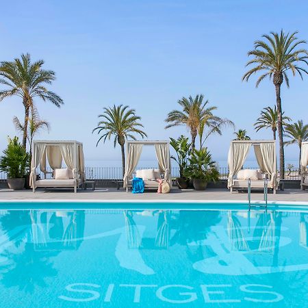 Me Sitges Terramar Exterior foto The pool at the hotel